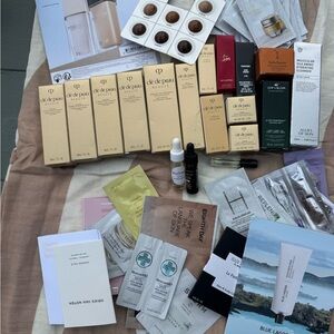 Cle de Peau Skincare Collection - Cream and Gold samples plus many others.